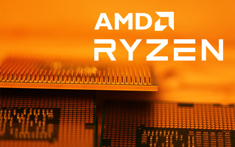 Photo of an AMD Ryzen 7950X CPU in orange tones with overlaying AMD Ryzen logo in white